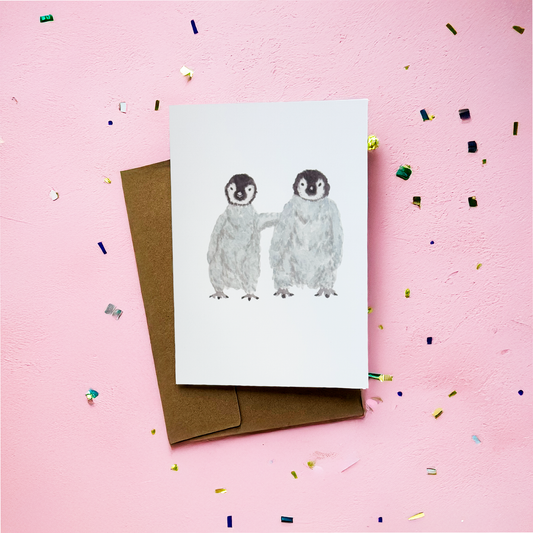 Cozy Penguins Greeting Card